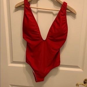 Red One Piece Plunging Neckline